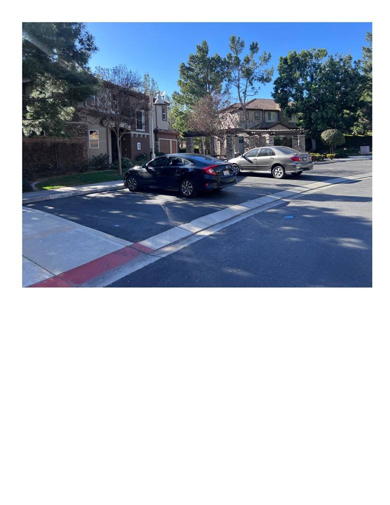 8692 East 9th Street, Unit 29 Rancho Cucamonga, CA 91730 - Photo 14 of 15 a couple of cars parked in front of a building