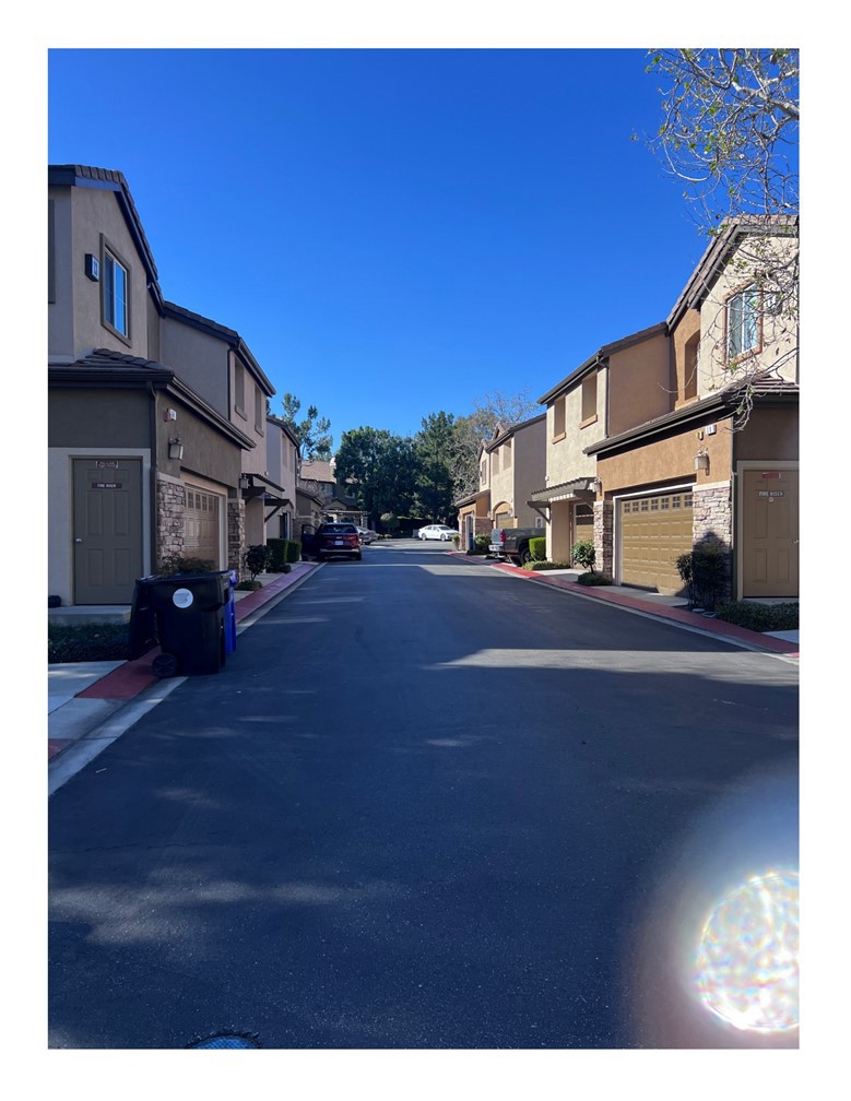 8692 East 9th Street, Unit 29 Rancho Cucamonga, CA 91730 - Photo 2 of 15 a view of a street in front of a house