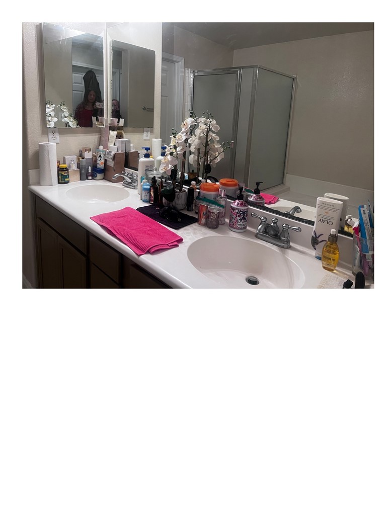 8692 East 9th Street, Unit 29 Rancho Cucamonga, CA 91730 - Photo 10 of 15 a bathroom with sink a mirror and vanity