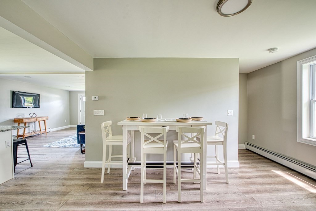 43 County Road East Freetown, MA 02717 - Photo 8 of 27 a view of a dining room with furniture and wooden floor