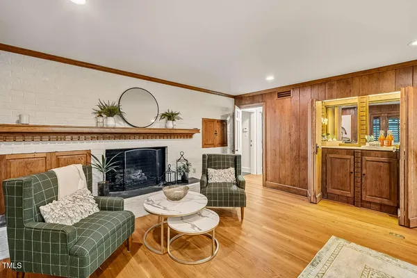 a balcony with table and chairs