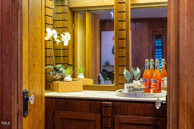 a outdoor living space with furniture and a fireplace