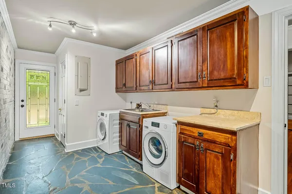 a view of house with outdoor space and garden