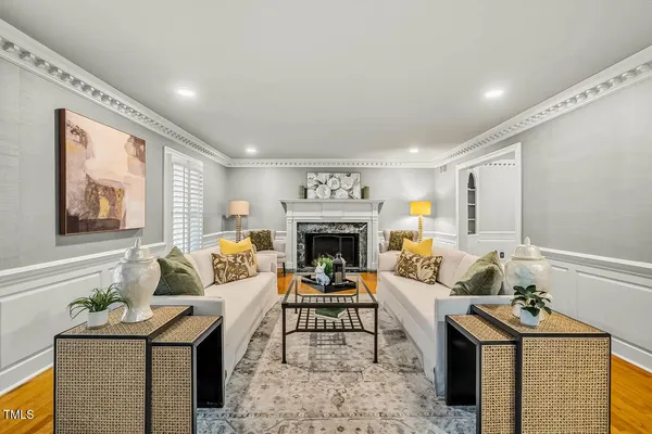 a view of a dining room with furniture and window