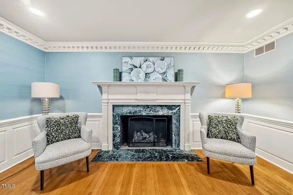 a kitchen with stainless steel appliances granite countertop a sink and a stove