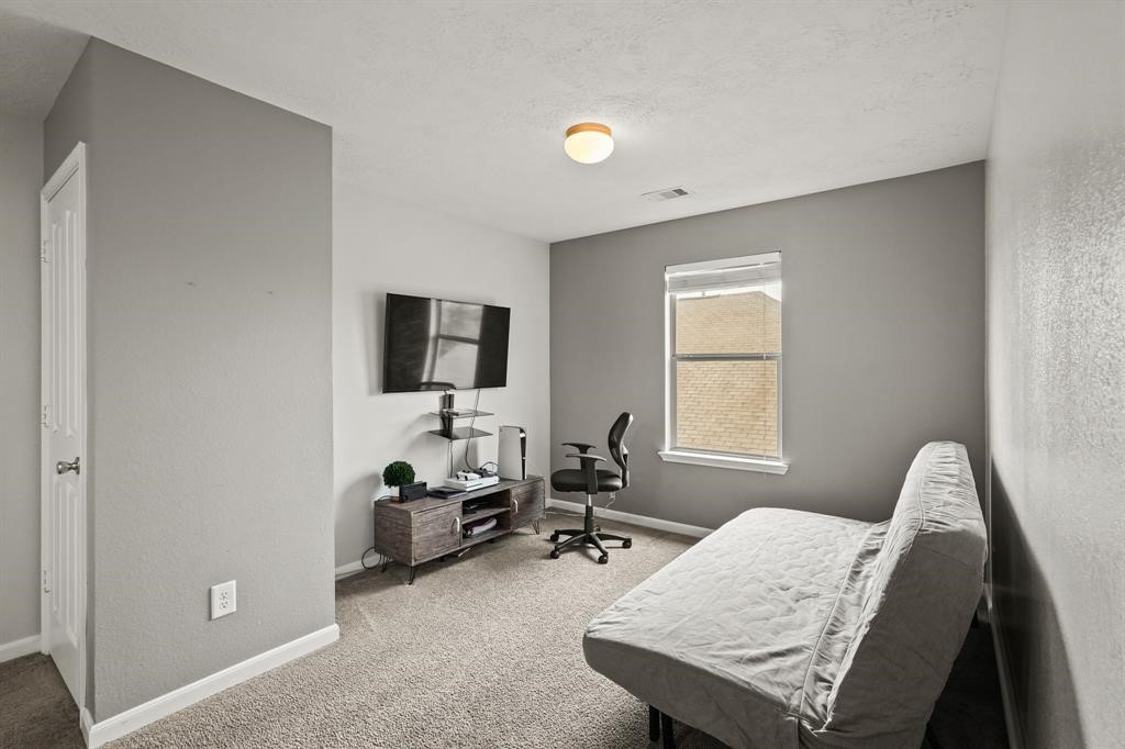 6719 Path Way Court Katy, TX 77449 - Photo 20 of 35 a living room with furniture and a window