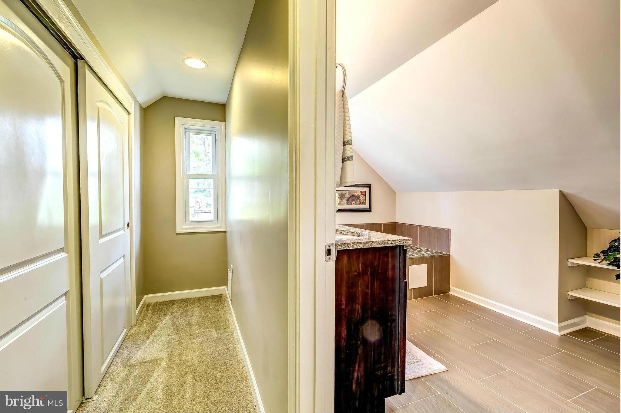 8304 Oakleigh Road Baltimore, MD 21234 - Photo 14 of 30 a view of hallway with wooden floor