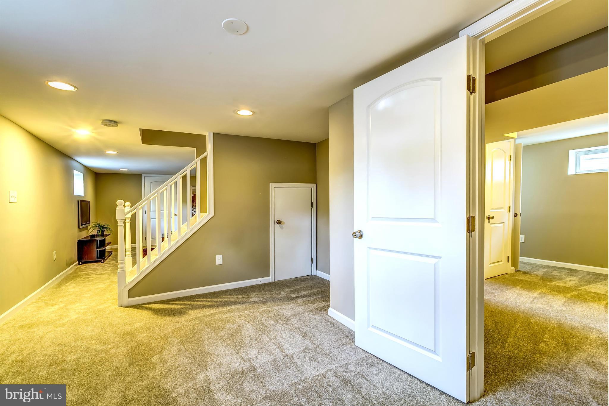 8304 Oakleigh Road Baltimore, MD 21234 - Photo 21 of 30 a view of a hallway with bathroom and bathroom
