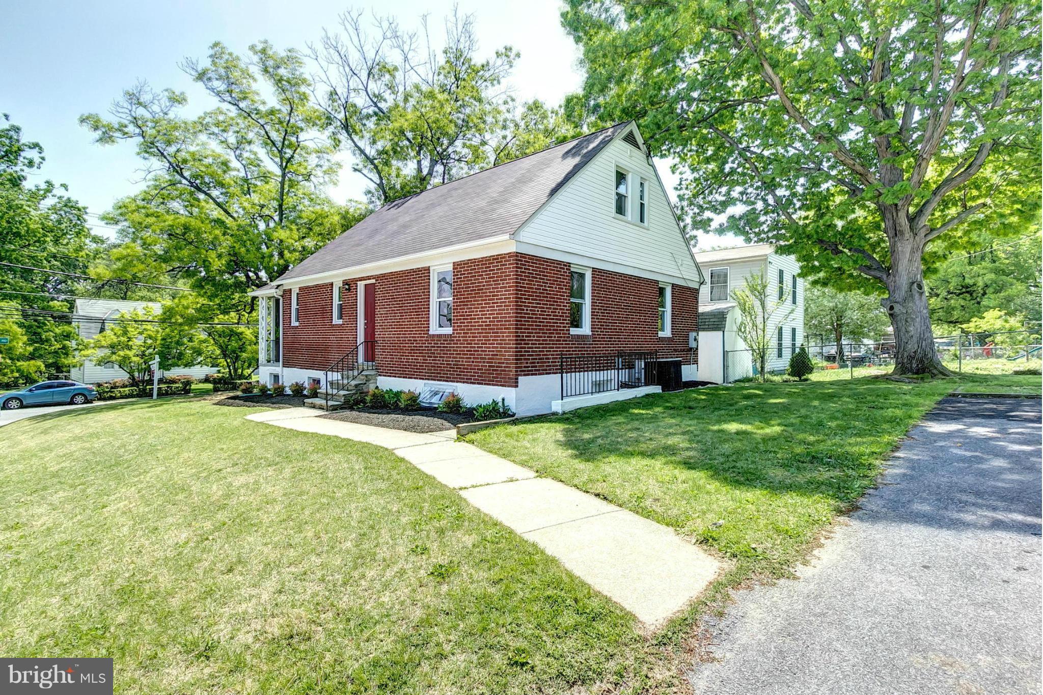 8304 Oakleigh Road Baltimore, MD 21234 - Photo 27 of 30 a view of a house with a yard