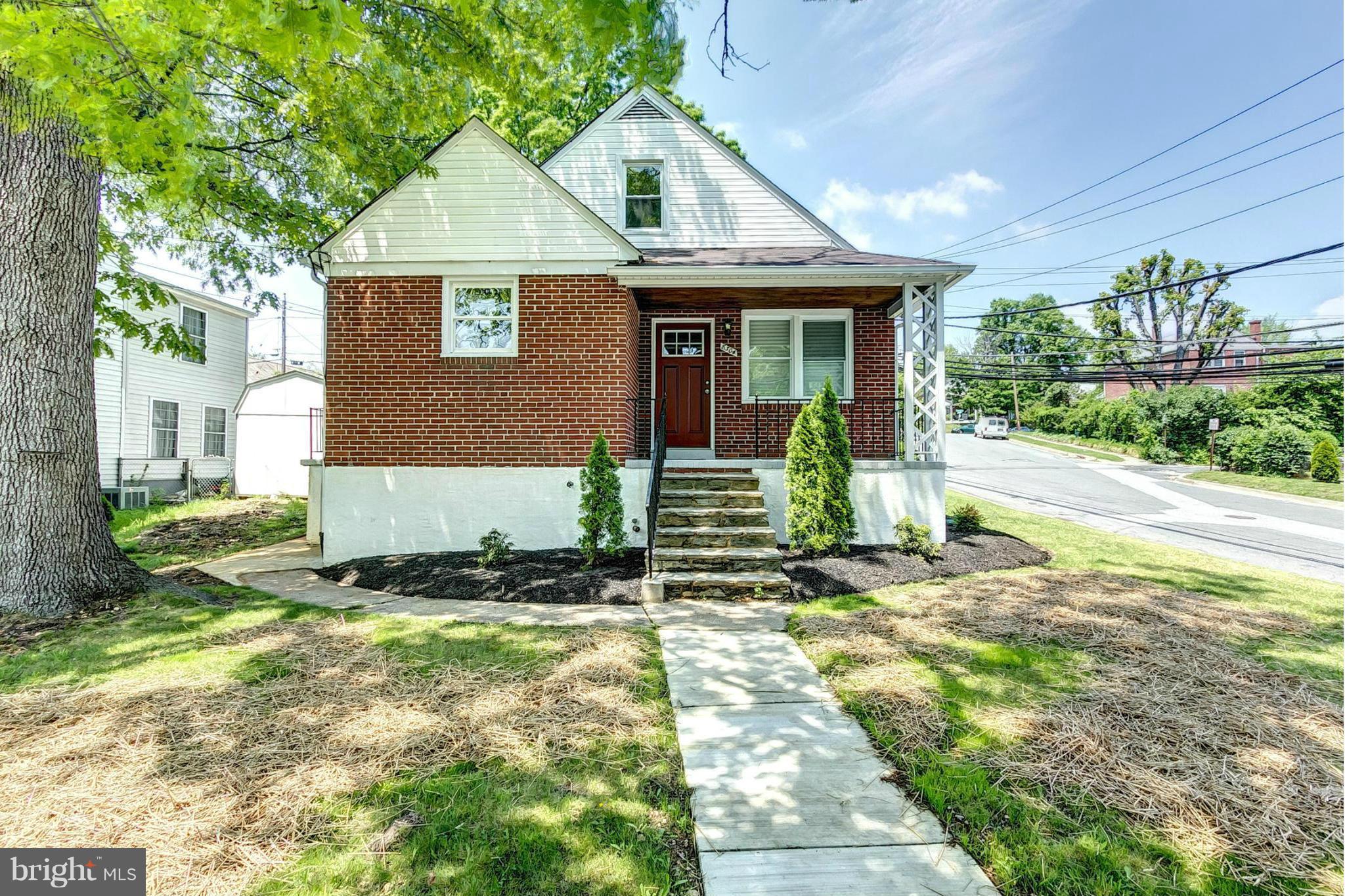 8304 Oakleigh Road Baltimore, MD 21234 - Photo 30 of 30 a front view of a house with garden