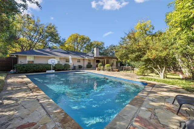 a view of a house with a swimming pool
