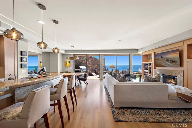 a living room with furniture a window and appliances