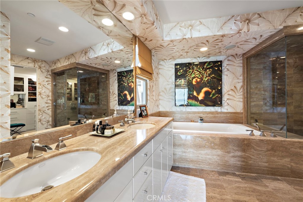 1603-1613 South Coast Highway, Unit F Laguna Beach, CA 92651 - Photo 16 of 34 a bathroom with a granite countertop sink mirror and vanity