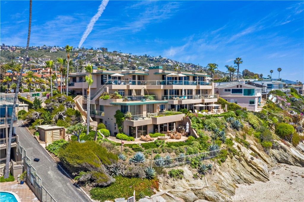 1603-1613 South Coast Highway, Unit F Laguna Beach, CA 92651 - Photo 31 of 34 a view of a lake with a building in the background