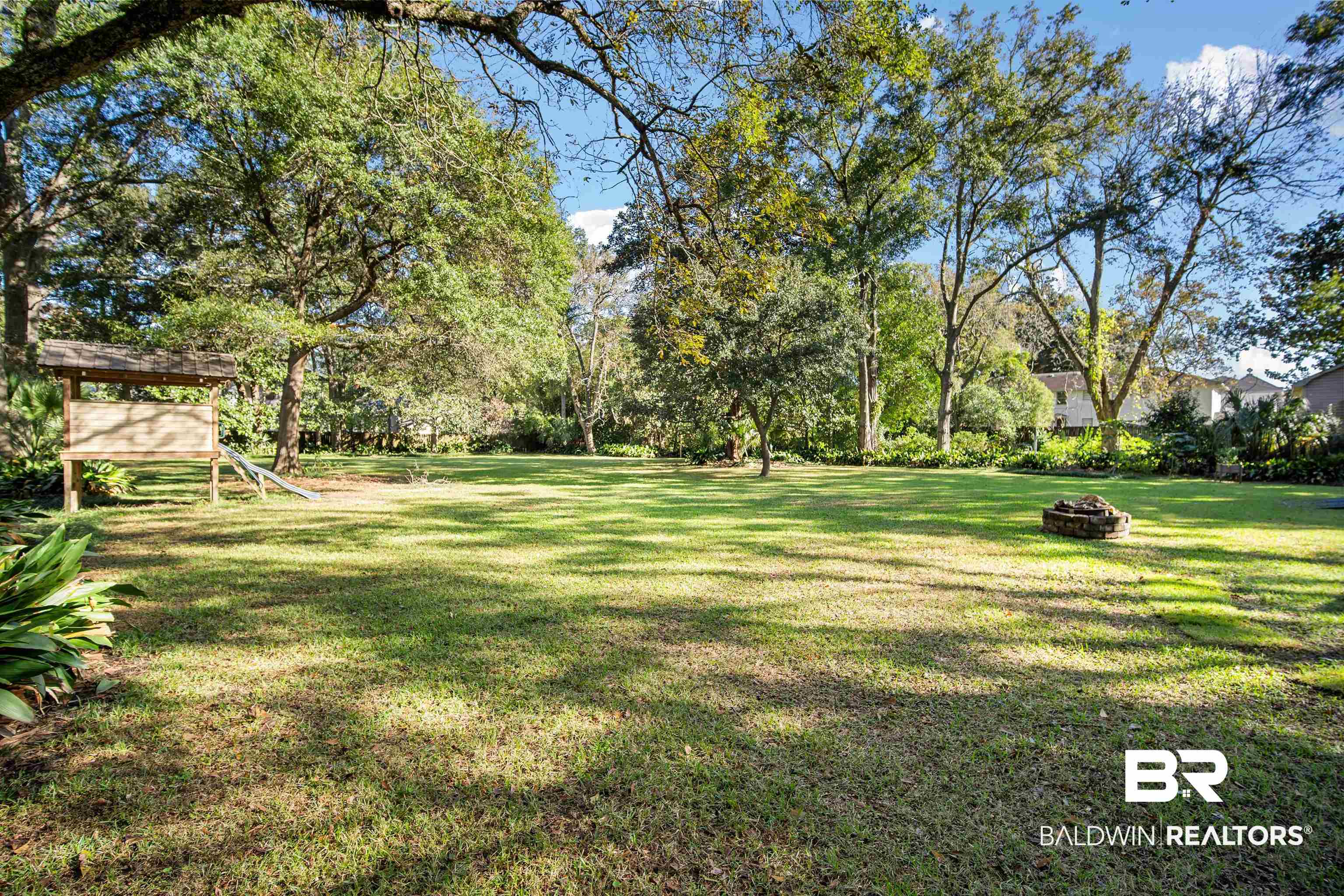 1314 Dauphin Street Mobile, AL 36604 - Photo 58 of 61 View of yard featuring an outdoor fire pit