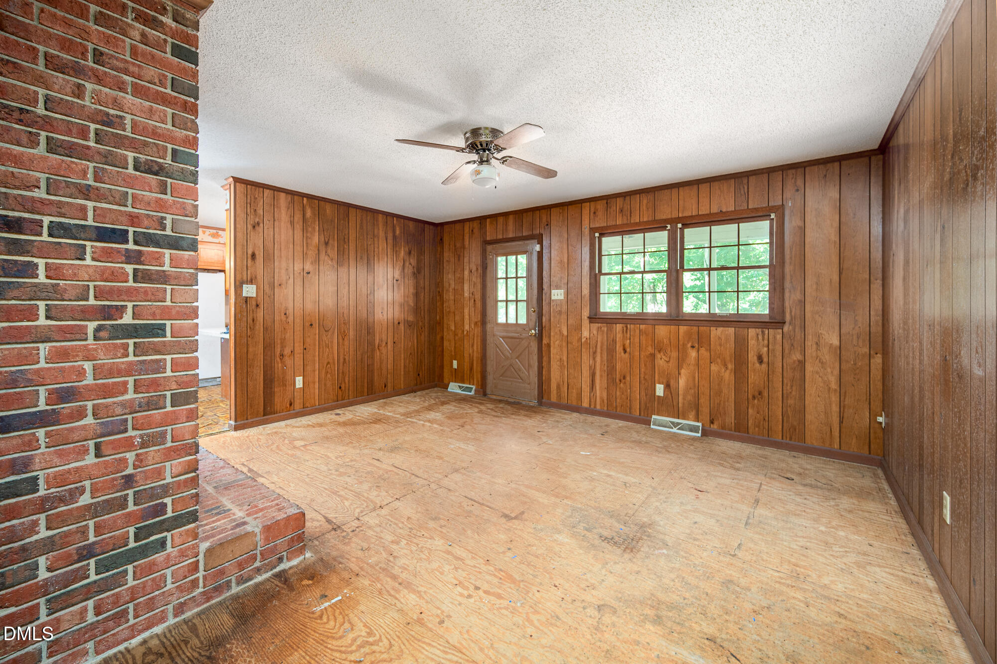 4411 Rhew Drive Durham, NC 27704 - Photo 12 of 34 a view of an empty room with a window