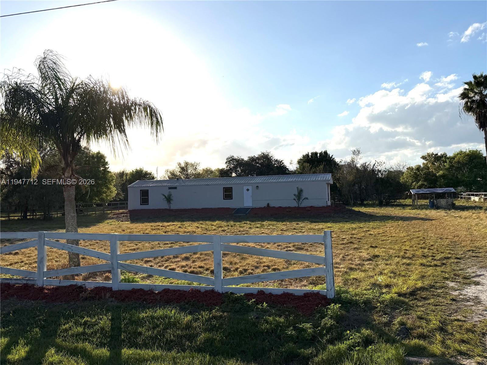 530 North Datil Street Clewiston, FL 33440 - Photo 1 of 10 a view of an ocean beach