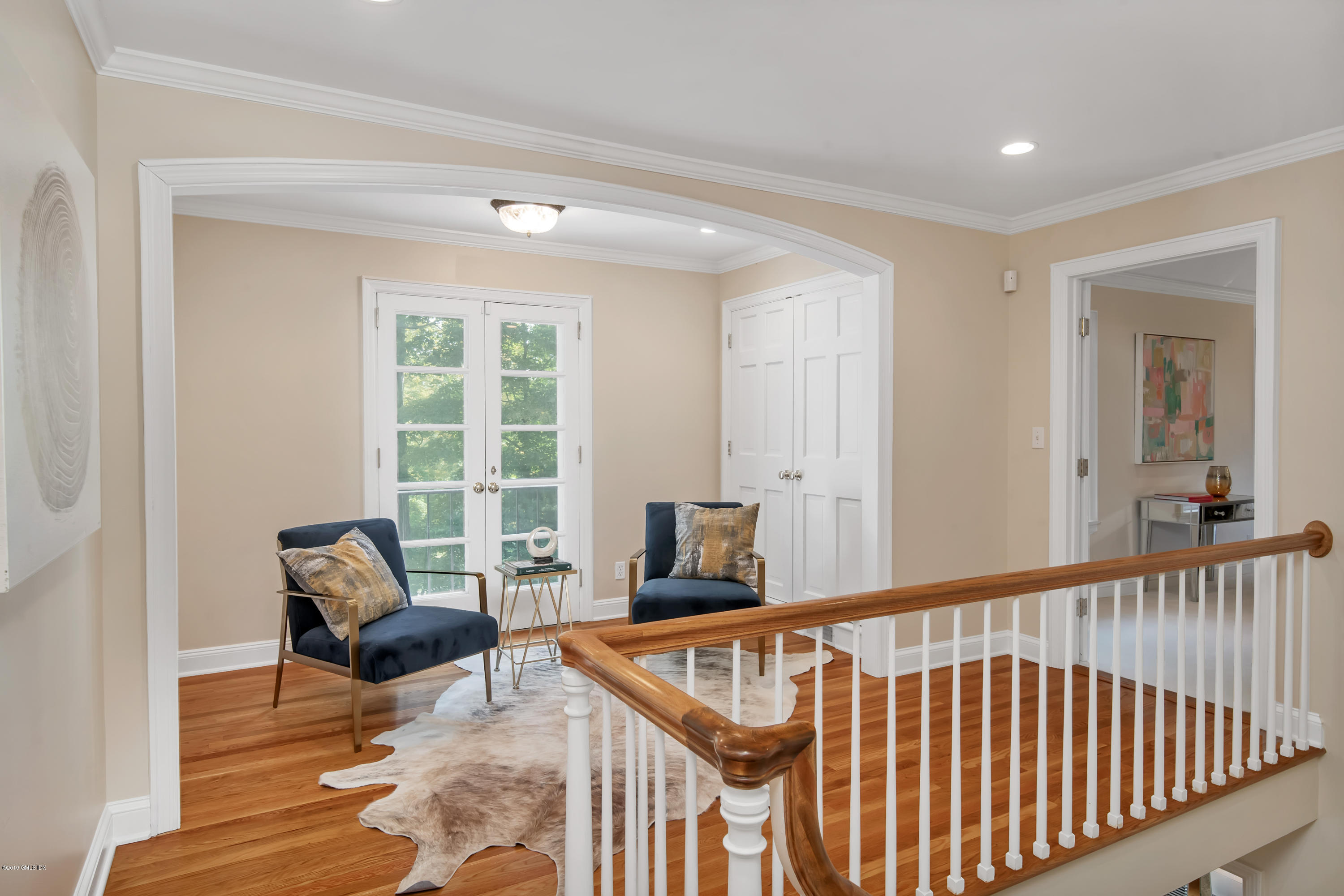95 Perkins Road Greenwich, CT 06830 - Photo 11 of 30 a living room with furniture and a window