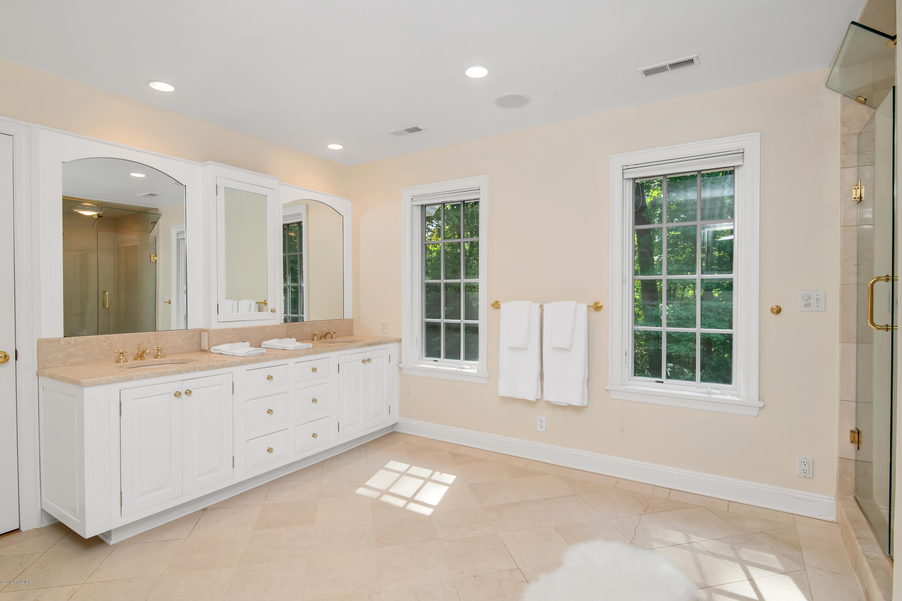 95 Perkins Road Greenwich, CT 06830 - Photo 13 of 30 a view of an empty room with window and cabinet