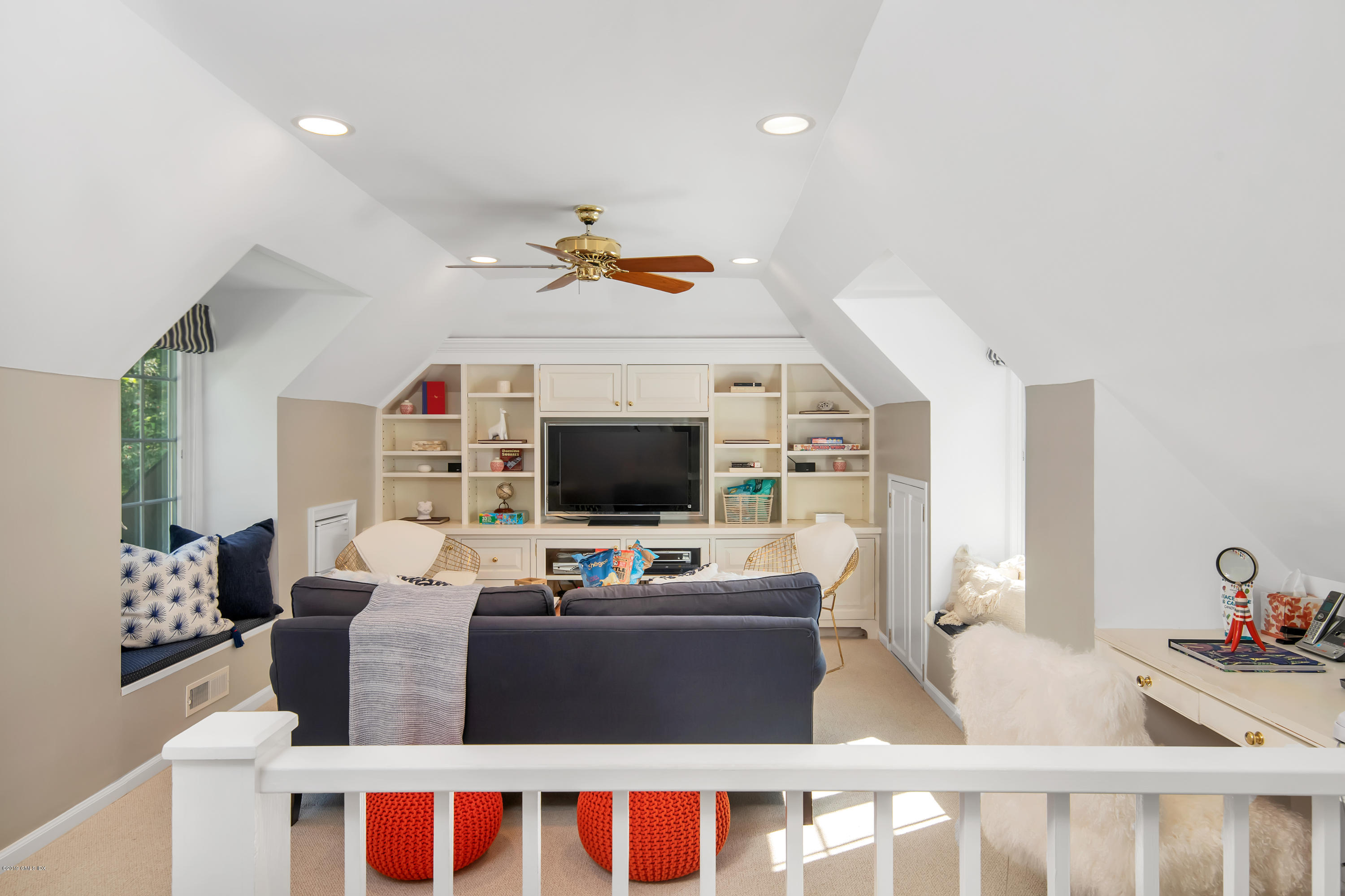 95 Perkins Road Greenwich, CT 06830 - Photo 19 of 30 a living room with furniture and a flat screen tv