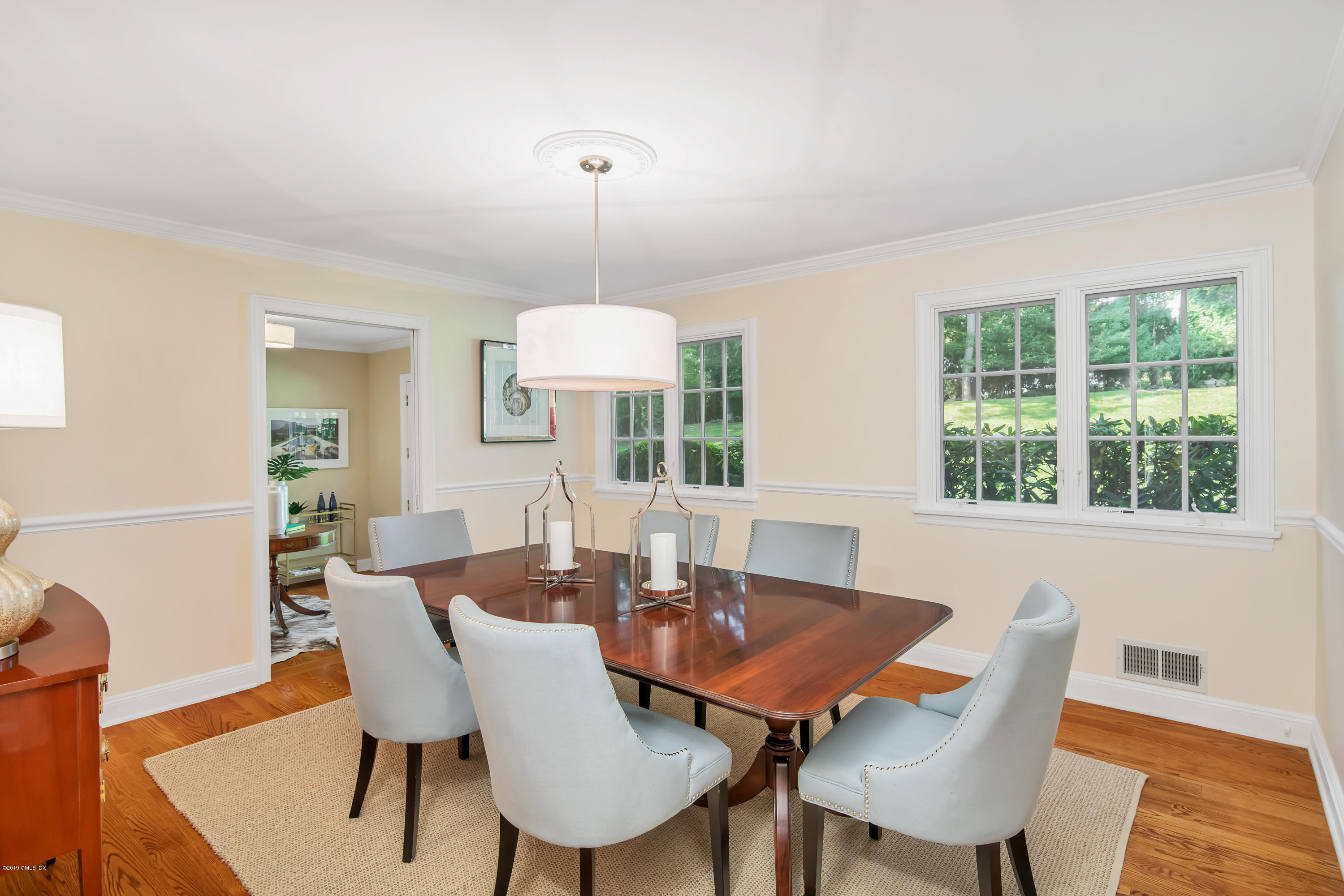 95 Perkins Road Greenwich, CT 06830 - Photo 4 of 30 a view of a dining room with furniture window and outside view
