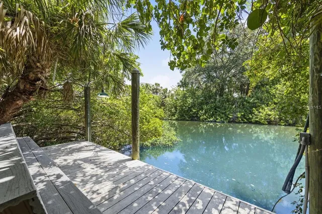 a view of a lake from a balcony