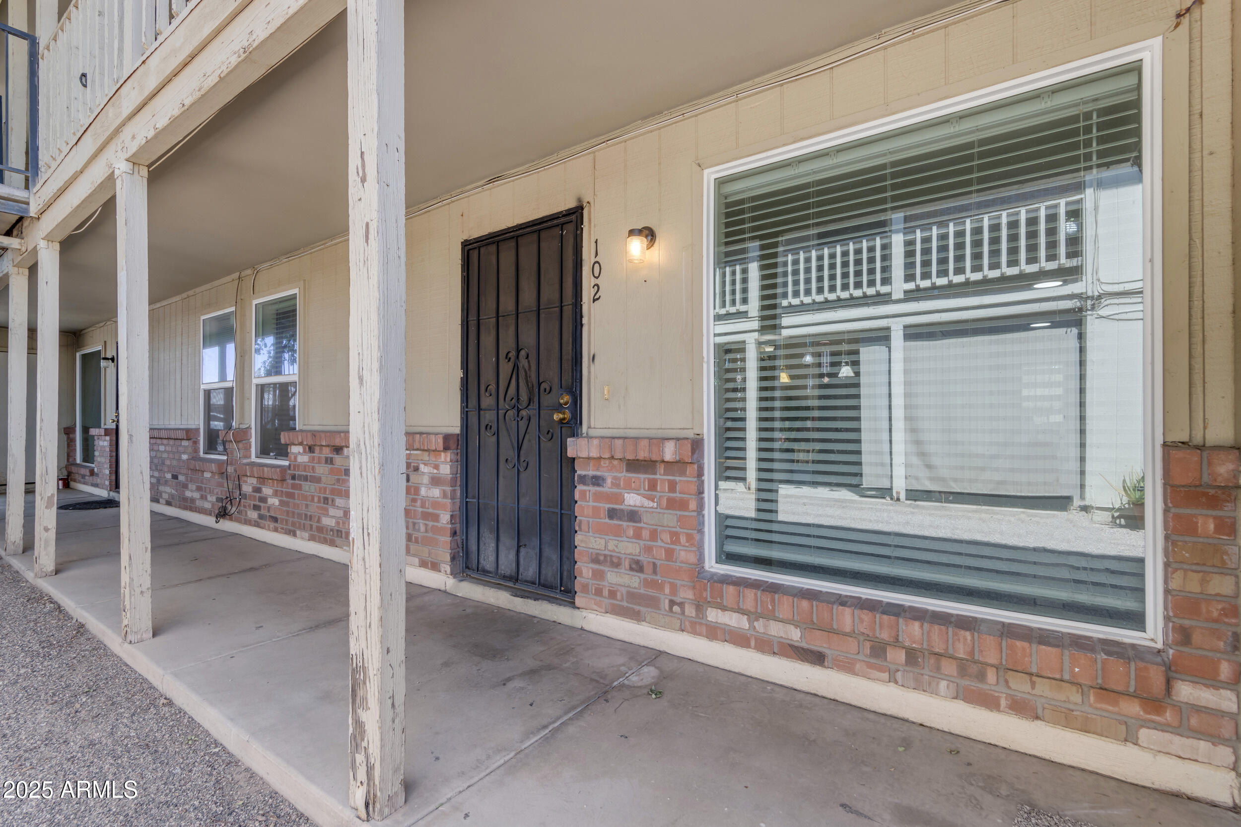 834 North Cherry, Unit 102 Mesa, AZ 85201 - Photo 4 of 24 a view of outdoor space deck and living room