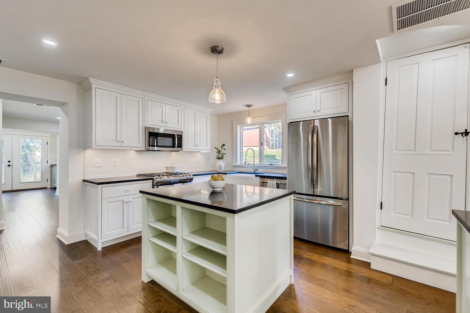 4001 Street Road Street, MD 21154 - Photo 12 of 42 Open shelving, stainless appliances.