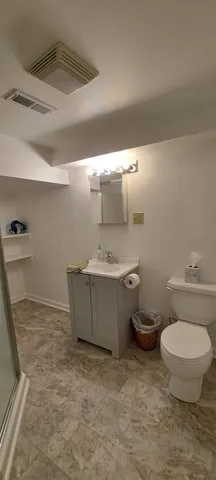 a bathroom with a sink and a toilet
