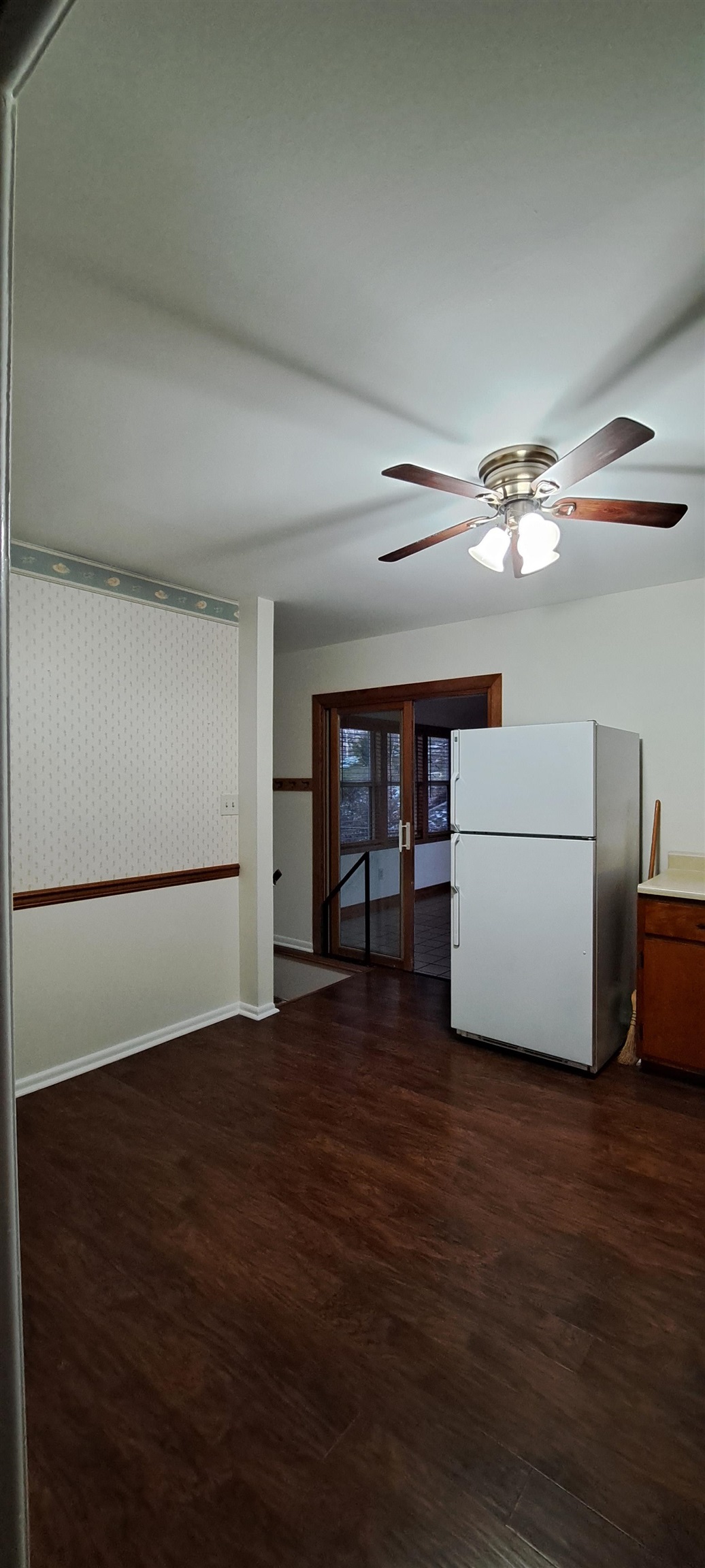 303 Old Greenville Road Staunton, VA 24401 - Photo 10 of 31 a view of an empty room with a window and a kitchen
