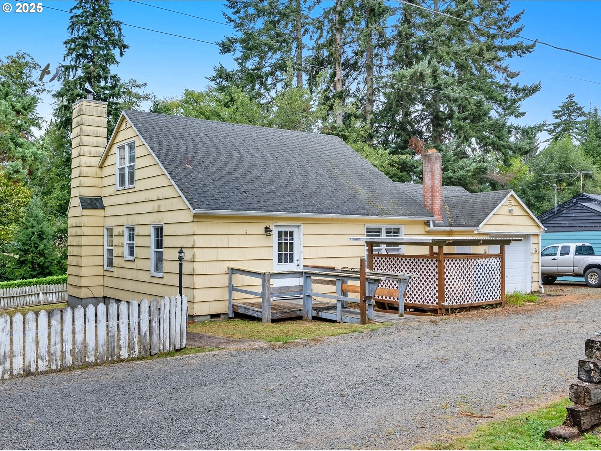 92965 Labeck Road Astoria, OR 97103 - Photo 2 of 31 a view of a house with backyard and sitting area