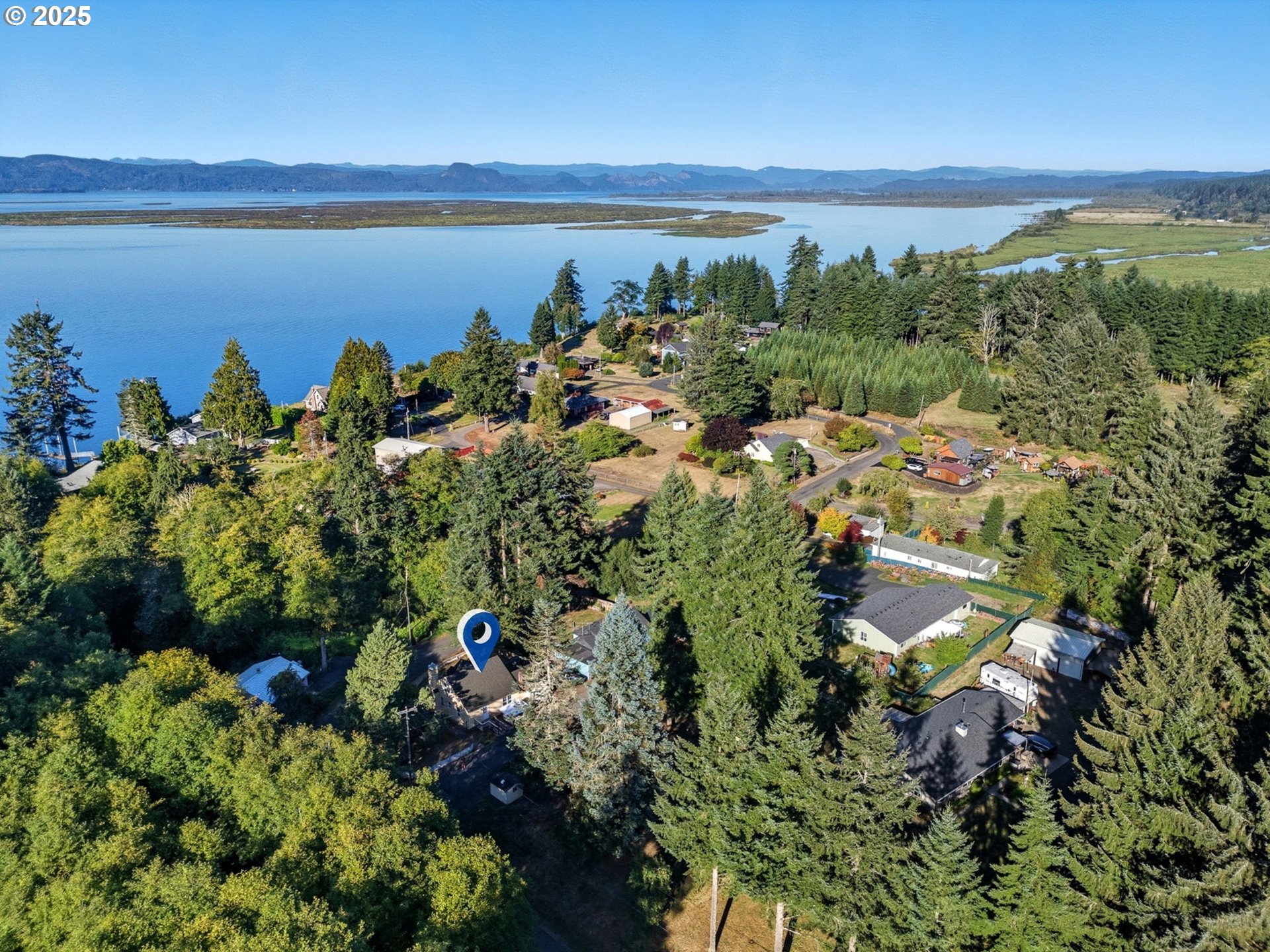 92965 Labeck Road Astoria, OR 97103 - Photo 25 of 31 a view of a city with lake view