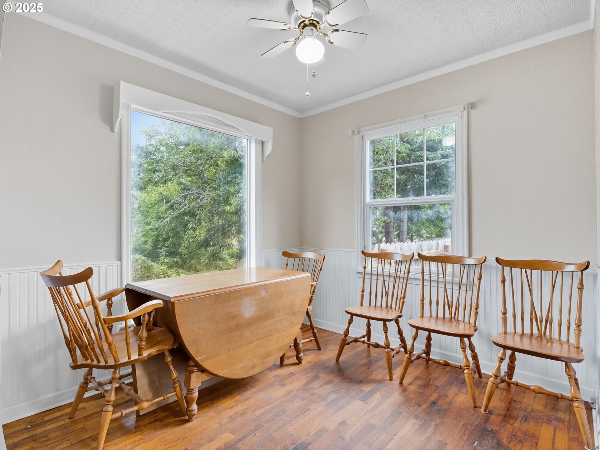 92965 Labeck Road Astoria, OR 97103 - Photo 5 of 31 a dining room with furniture window and wooden floor