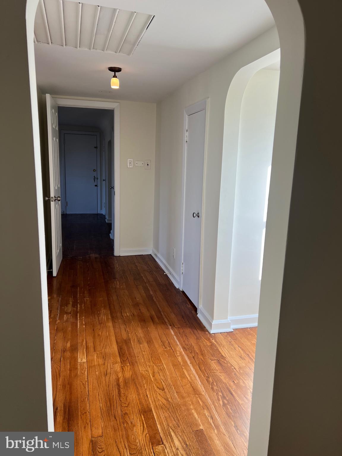 231 Highway 73 Hammonton, NJ 08037 - Photo 13 of 20 a view of a hallway with wooden floor