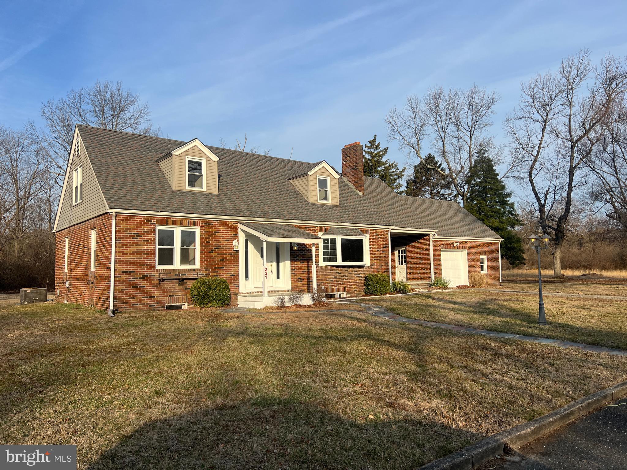 231 Highway 73 Hammonton, NJ 08037 - Photo 2 of 20 a front view of a house with a yard