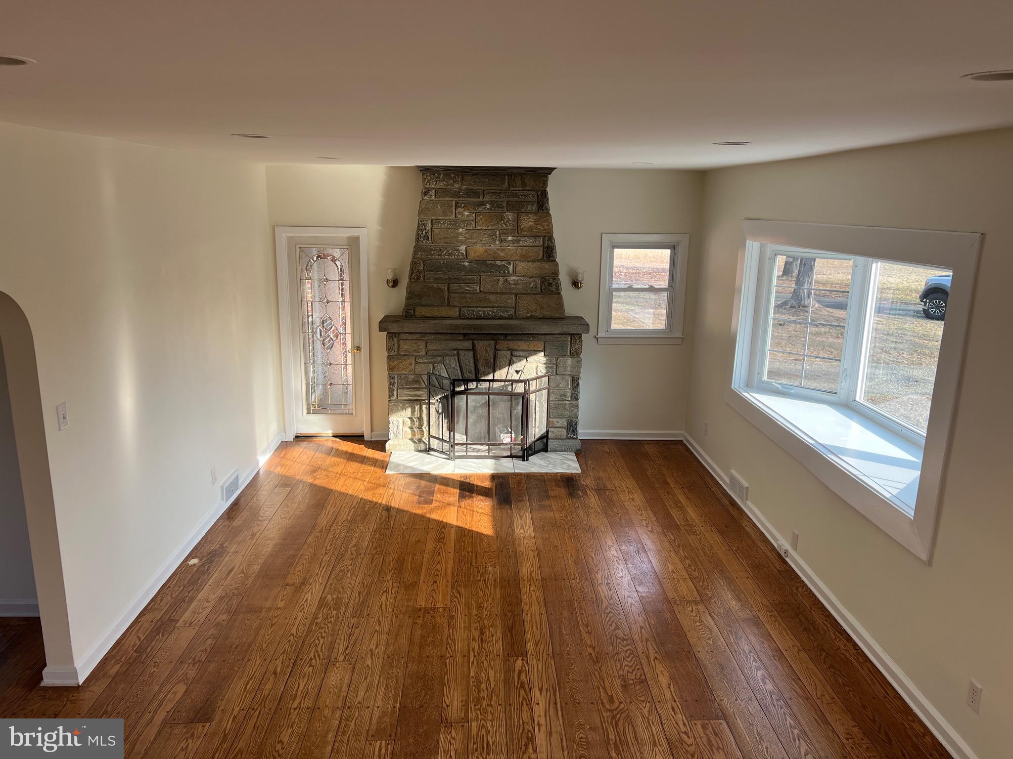 231 Highway 73 Hammonton, NJ 08037 - Photo 6 of 20 a view of empty room with wooden floor and fan