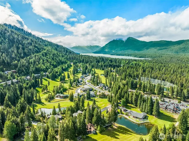 a view of a lake with a big yard