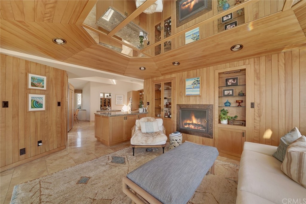 37 Emerald Bay Laguna Beach, CA 92651 - Photo 26 of 52 a living room with furniture and a fireplace