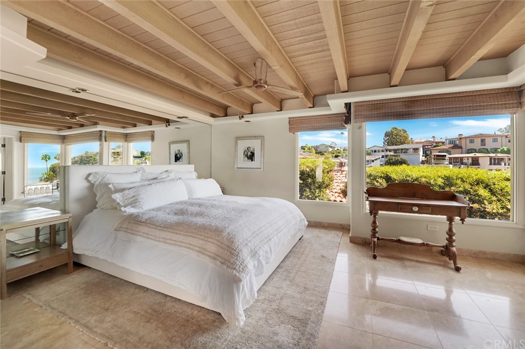 37 Emerald Bay Laguna Beach, CA 92651 - Photo 31 of 52 a bedroom with a bed and a window
