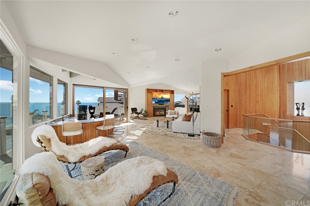 37 Emerald Bay Laguna Beach, CA 92651 - Photo 7 of 52 a living room with furniture and a large window