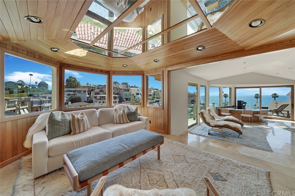 37 Emerald Bay Laguna Beach, CA 92651 - Photo 8 of 52 a living room with furniture and a large window
