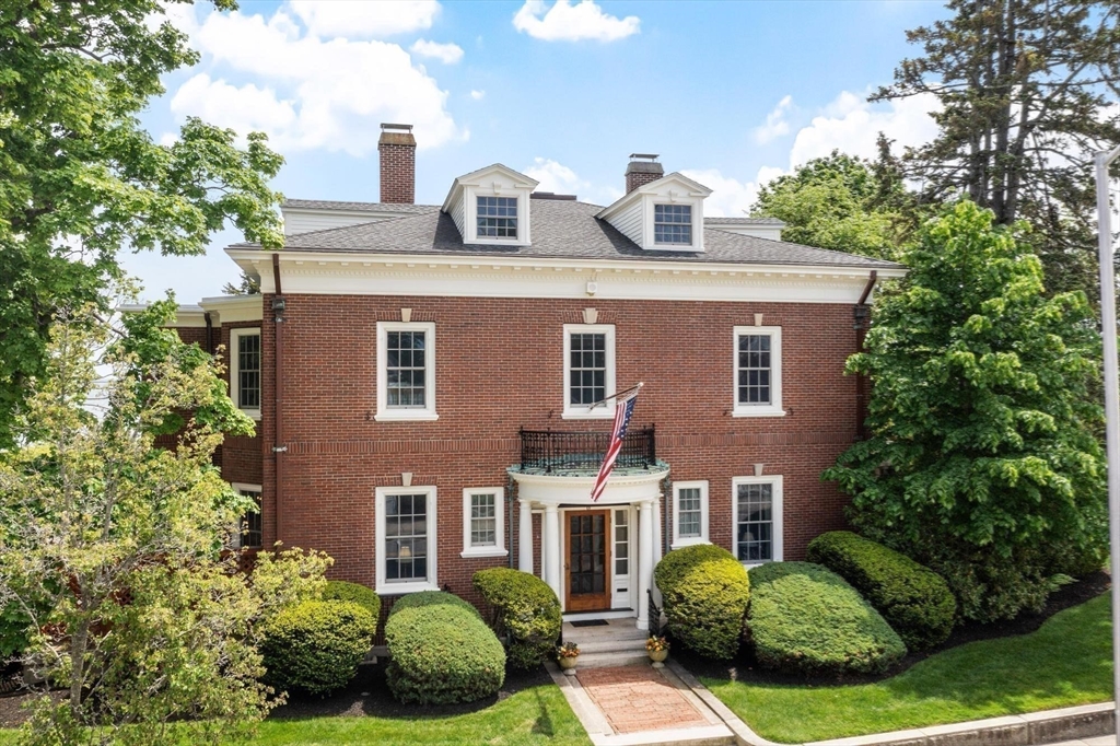 89 Lothrop Street Beverly, MA 01915 - Photo 41 of 41 a front view of a house with a garden