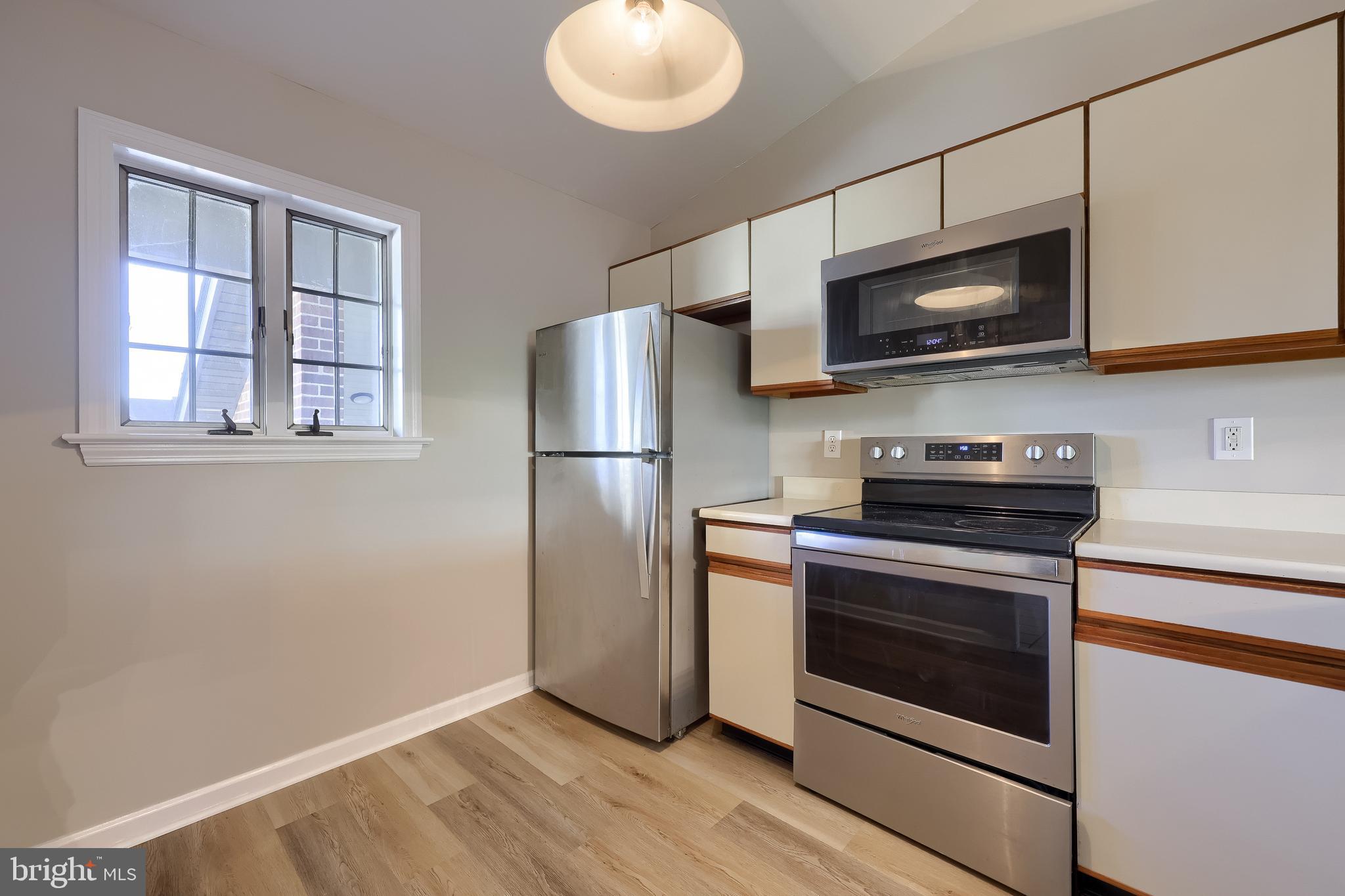 33 Black Oak Drive Lancaster, PA 17602 - Photo 14 of 46 a kitchen with stainless steel appliances a stove microwave and refrigerator