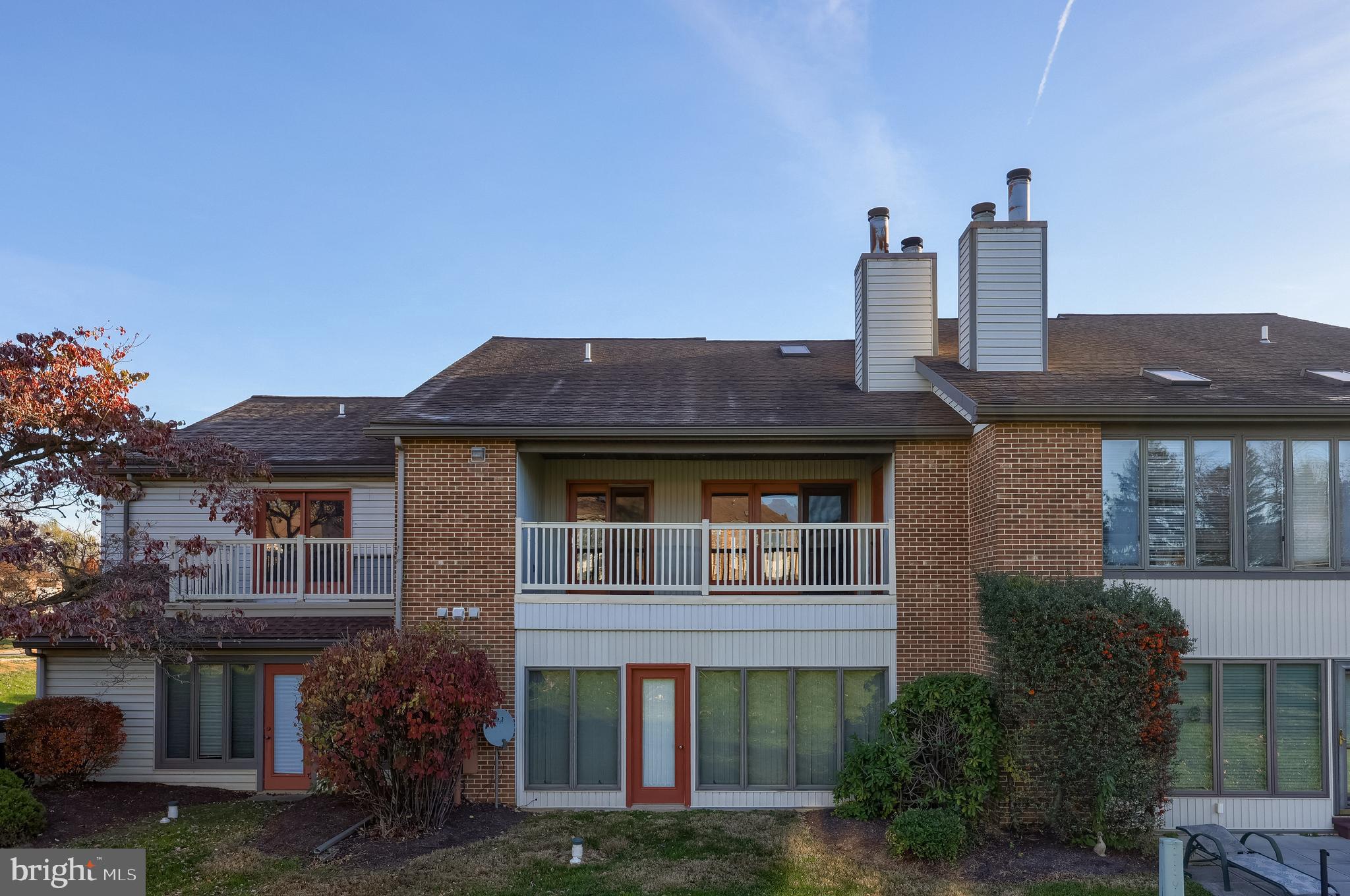 33 Black Oak Drive Lancaster, PA 17602 - Photo 36 of 46 a front view of a house with a garden and plants
