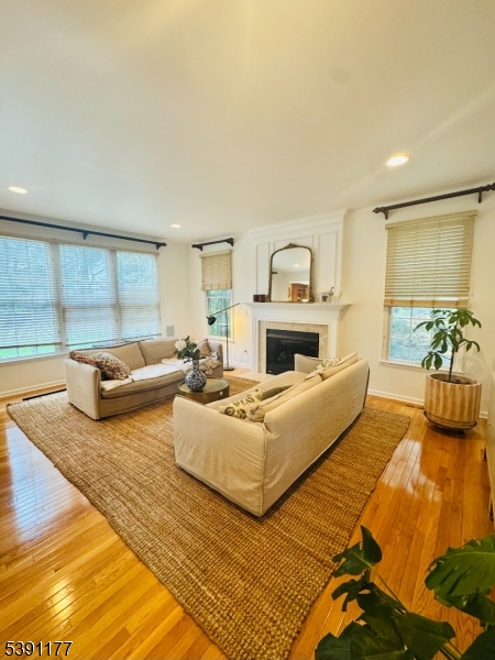 2 Bedford Drive Bernards, NJ 07920 - Photo 13 of 33 a living room with furniture and a fireplace