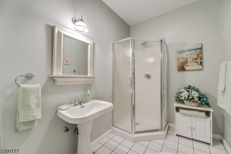 2 Bedford Drive Bernards, NJ 07920 - Photo 27 of 33 a bathroom with a sink toilet and mirror