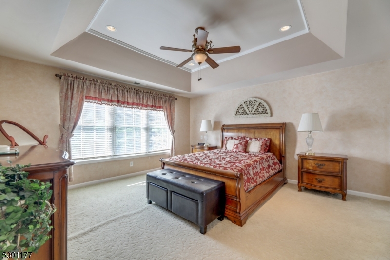 2 Bedford Drive Bernards, NJ 07920 - Photo 29 of 33 a bedroom with a bed and a window