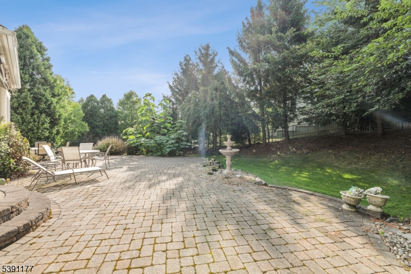 2 Bedford Drive Bernards, NJ 07920 - Photo 3 of 33 a view of a yard with plants and large trees