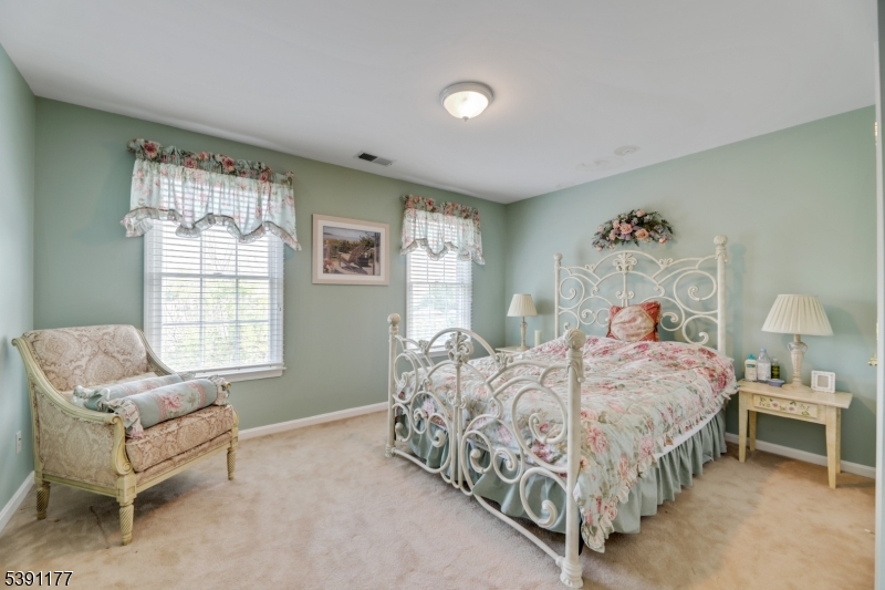 2 Bedford Drive Bernards, NJ 07920 - Photo 31 of 33 a bedroom with a bed and a couch