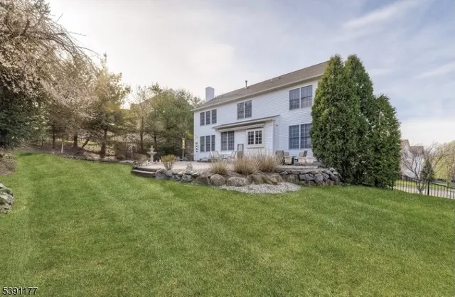 a house view with a garden space